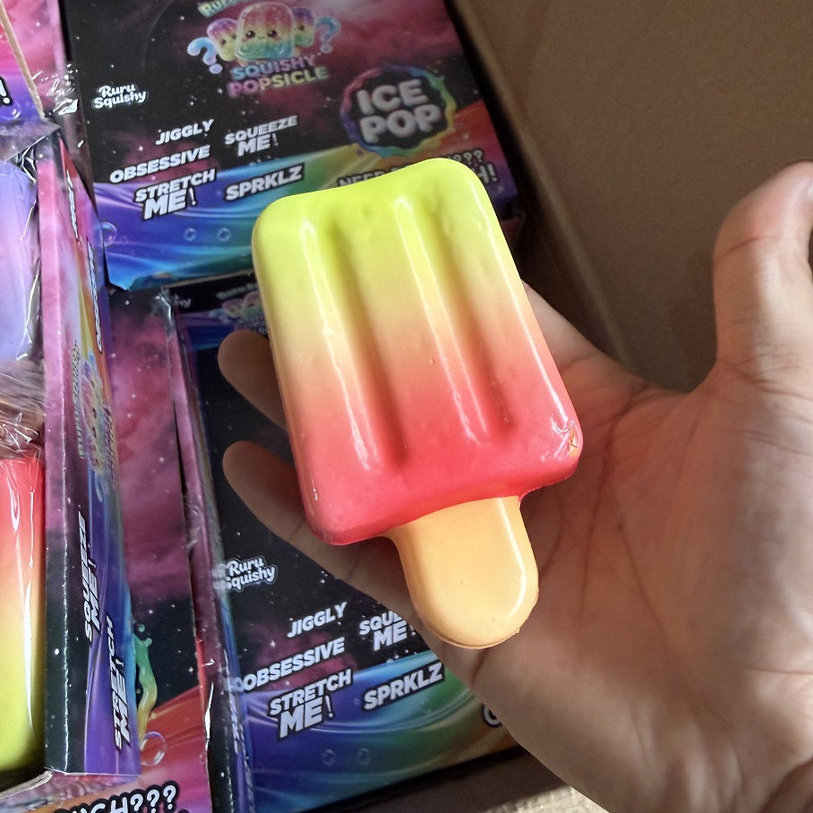 Gradient popsicle squeeze toy held in hand