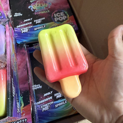 Gradient popsicle squeeze toy held in hand
