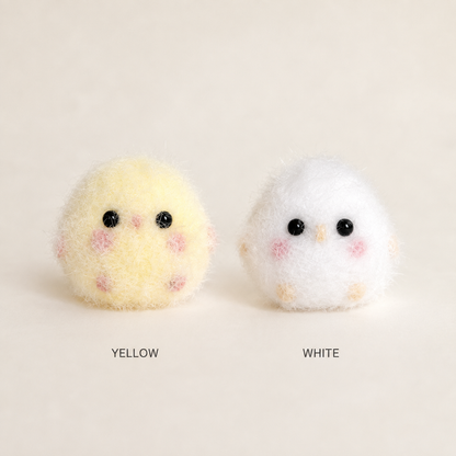 Yellow and white fuzzy chicken sensory toy colors
