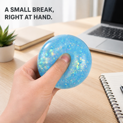 Blue glitter ball in a bright home-office scene