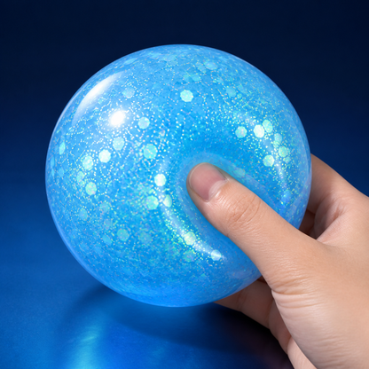 Blue glitter gel squeeze ball with hand pressing the toy