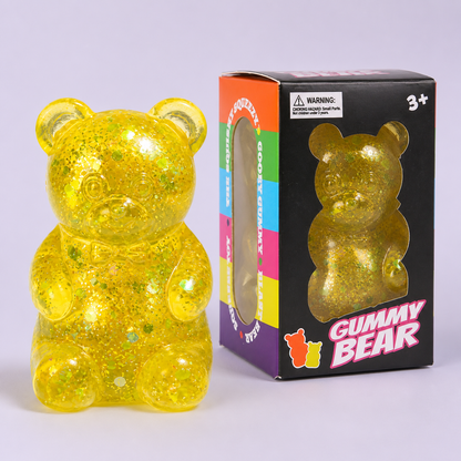 Yellow glitter gummy bear squishy with individual retail box