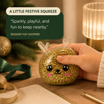 Gold glitter reindeer sensory squeeze toy in a festive desk lifestyle scene