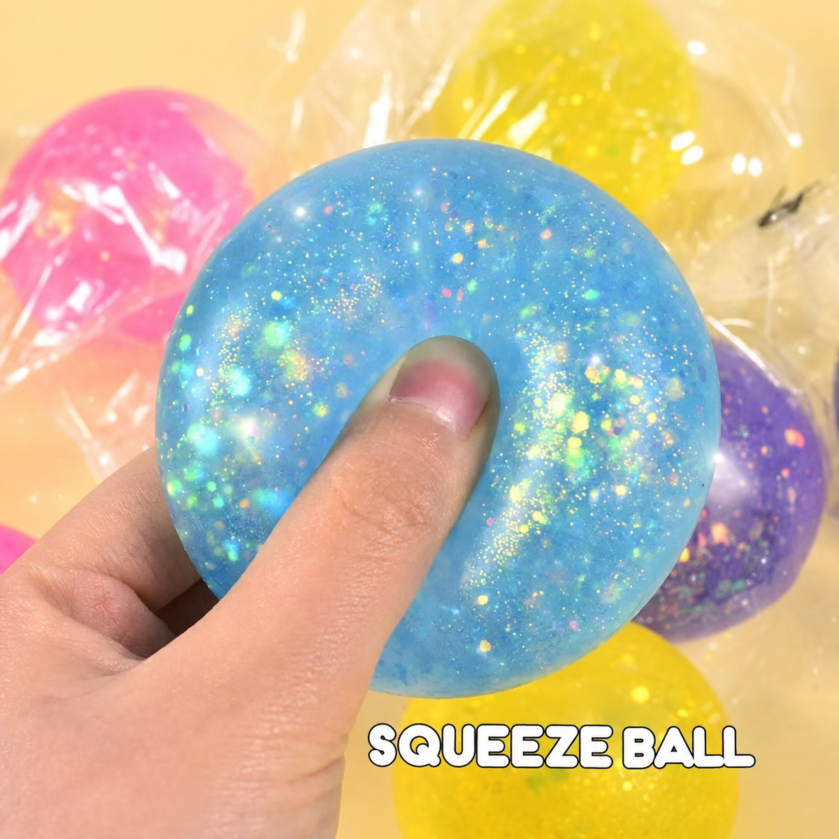 Blue translucent glitter squeeze ball, supplier text removed