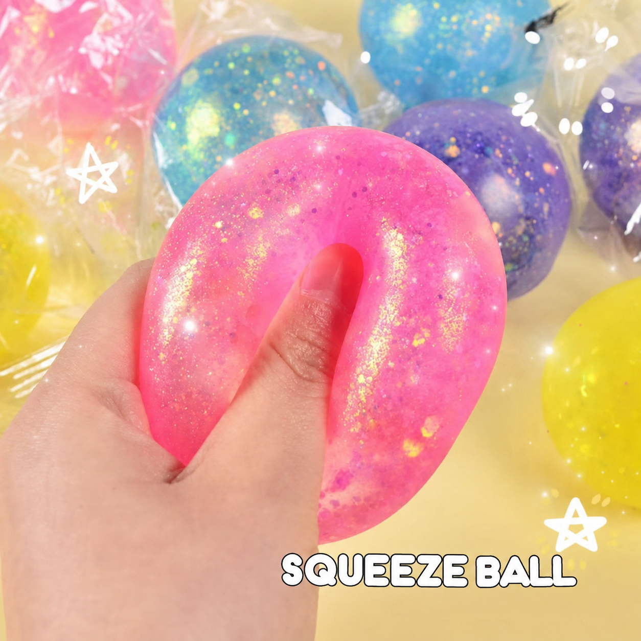 Pink translucent glitter squeeze ball, supplier text removed