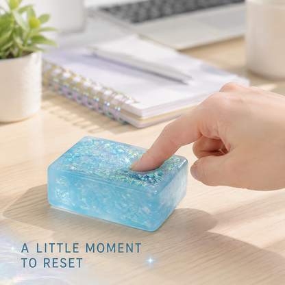 Blue glitter tofu block on a bright home-office desk