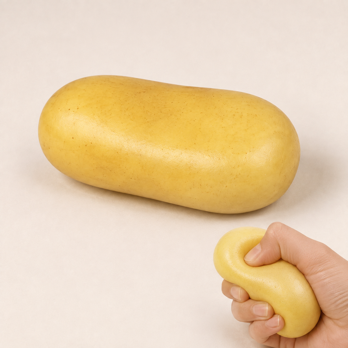 Mini potato fluid-filled sensory squeeze toy hero and squeeze action