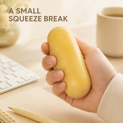 Mini potato fluid-filled sensory squeeze toy lifestyle squeeze scene