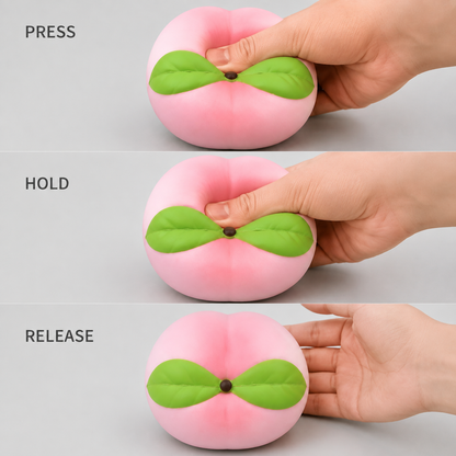 Peach Slow-Rise PU Sensory Squeeze Toy — Squeeze action