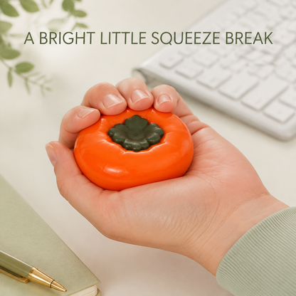 Persimmon fluid-filled sensory squeeze toy lifestyle use