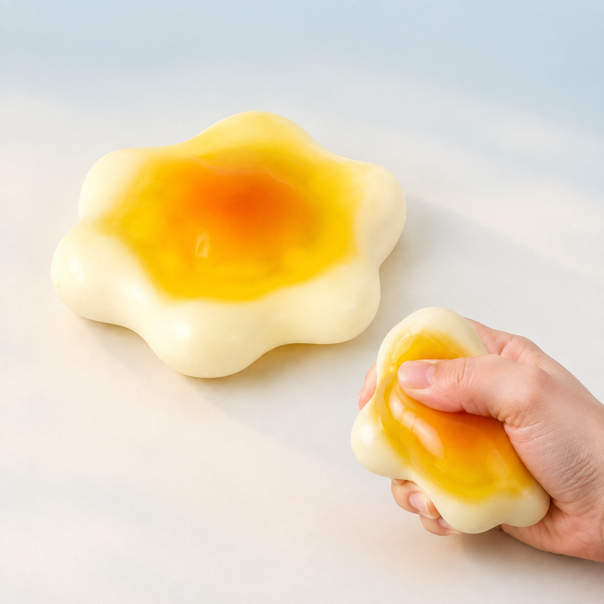 Soymilk fluid-filled sensory squeeze toy hero with hand-squeeze demonstration
