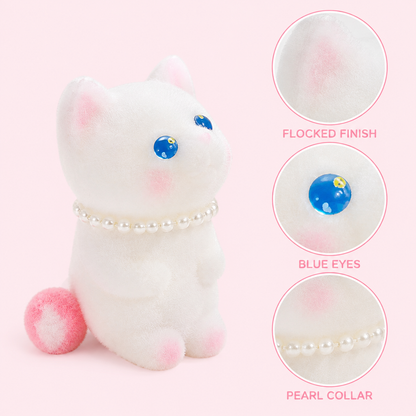 White playful cat flocked finish blue eyes and pearl collar details