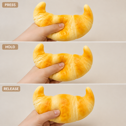 Yellow Croissant Slow-Rise PU Sensory Squeeze Toy — Squeeze action