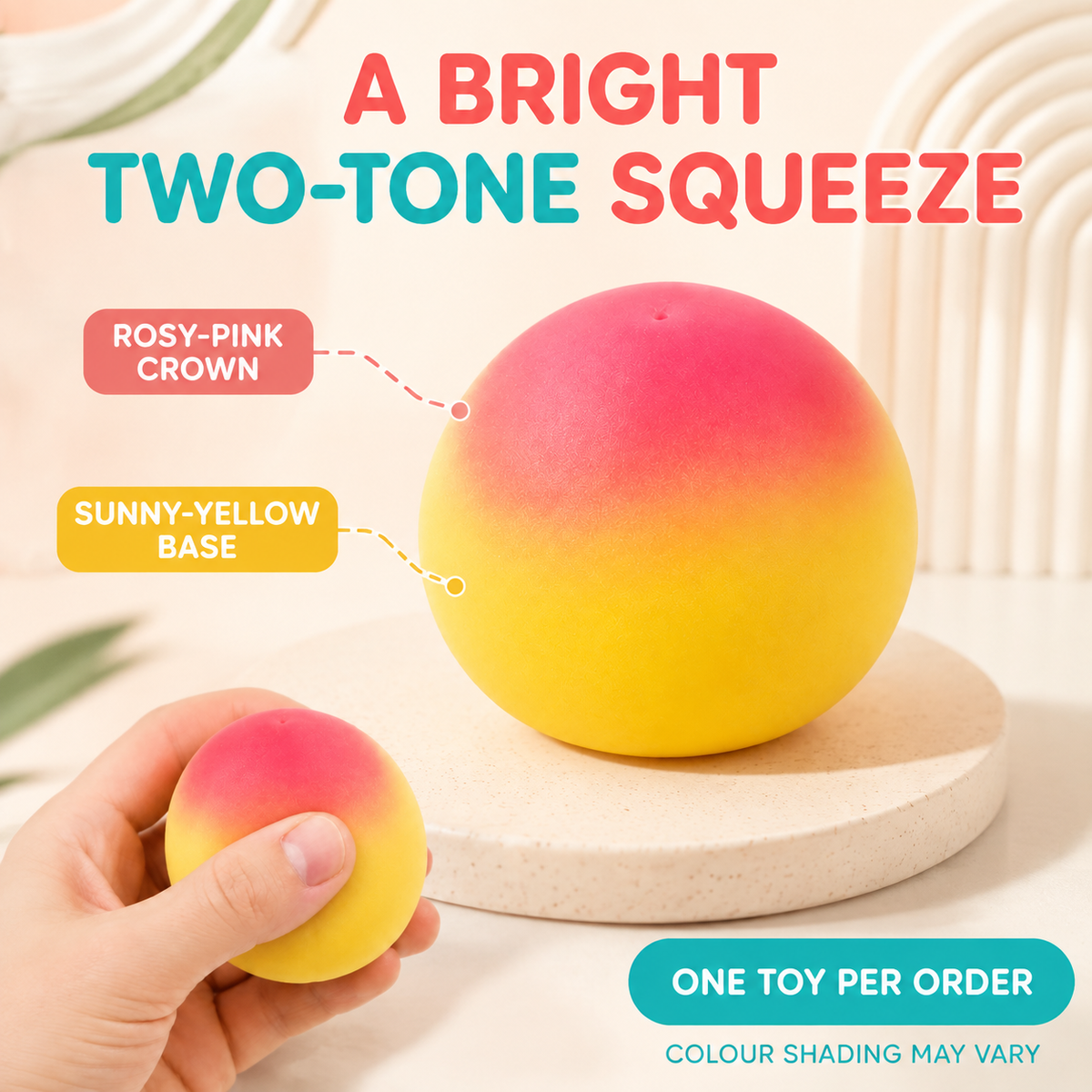 Two-tone yellow and pink features of the peach-shaped sensory toy